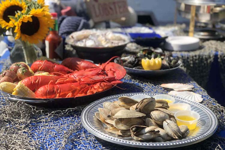 Unleash the Flavorful Delights of Summer with Burnham's Clambake Catering